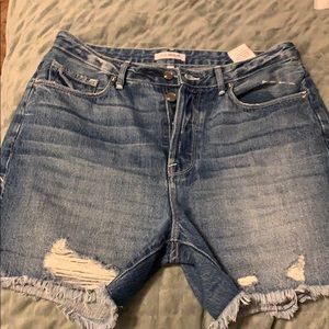 Distressed high waisted button up shorts